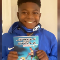 12-year old boy makes history, publishes book about black superhero